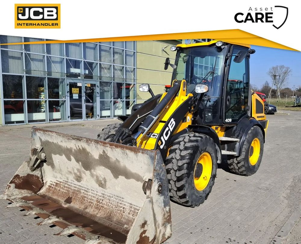 JCB 409 - Gumikerekes kotró: 1 kép. JCB 409 - Gumikerekes kotró: 1 kép.