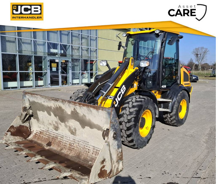 JCB 409 - Gumikerekes homlokrakodó: 1 kép. JCB 409 - Gumikerekes homlokrakodó: 1 kép.