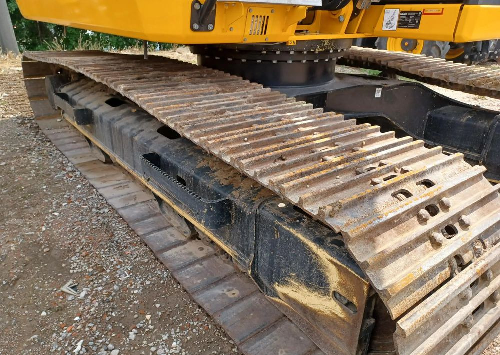 Lánctalpas kotró JCB JS 220X: 11 kép.