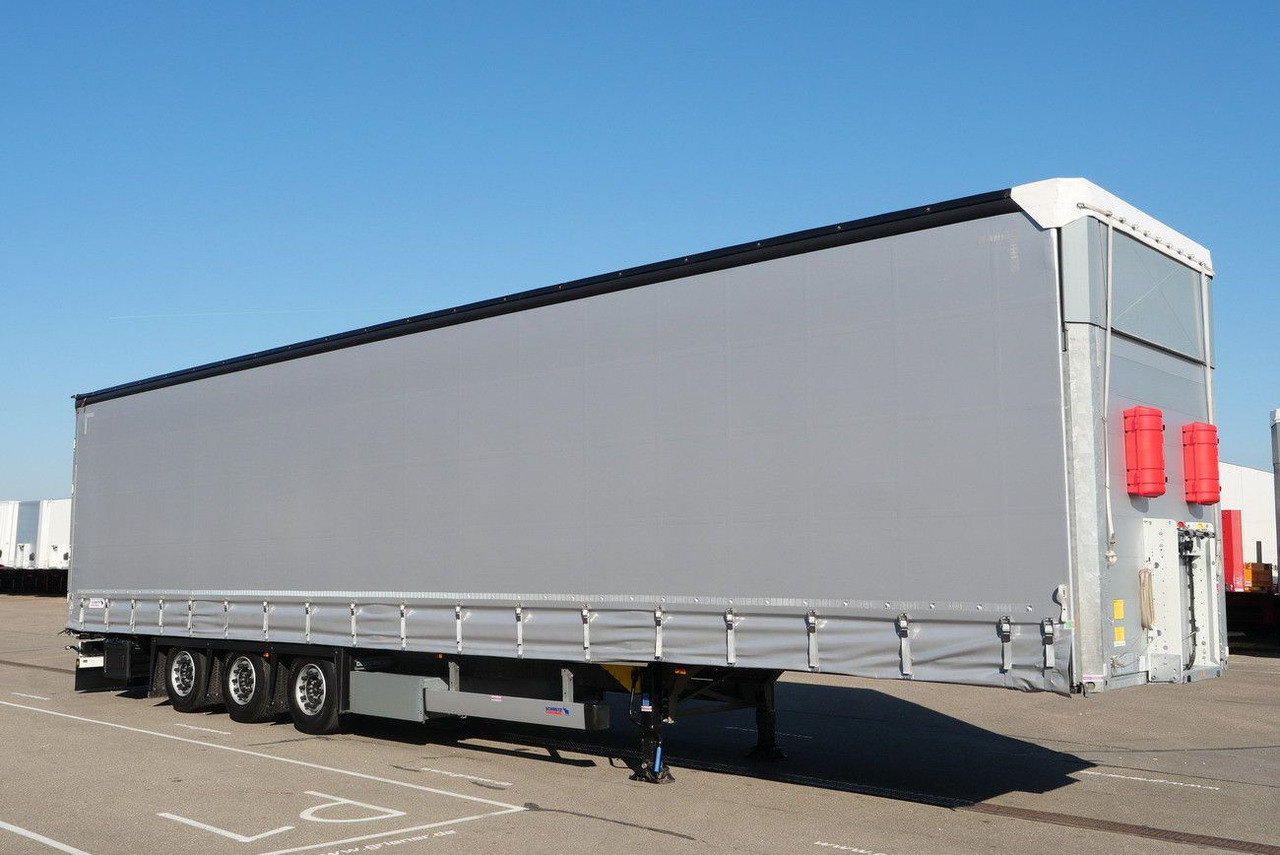 Schmitz Cargobull SCS 24 /MEGA VARIOS LASI 12642 XL /2,75 -3,05 m - Ponyvás félpótkocsi: 4 kép. Schmitz Cargobull SCS 24 /MEGA VARIOS LASI 12642 XL /2,75 -3,05 m - Ponyvás félpótkocsi: 4 kép.