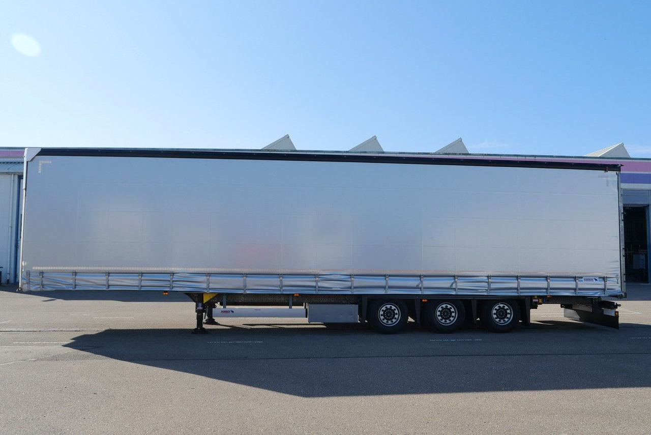 Schmitz Cargobull SCS 24 /MEGA VARIOS LASI 12642 XL /2,75 -3,05 m - Ponyvás félpótkocsi: 5 kép. Schmitz Cargobull SCS 24 /MEGA VARIOS LASI 12642 XL /2,75 -3,05 m - Ponyvás félpótkocsi: 5 kép.
