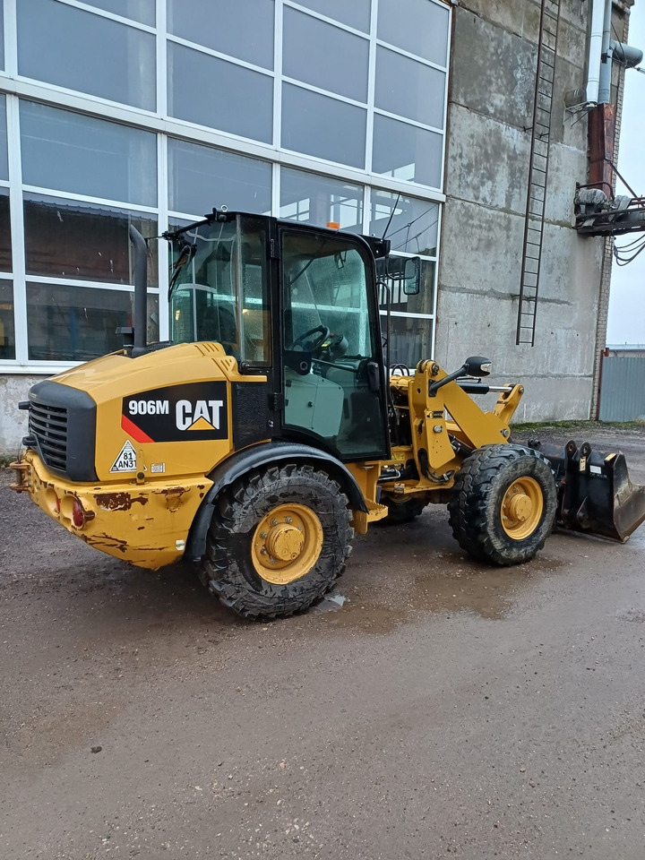 CATERPILLAR 906M - Kotrórakodó: 1 kép. CATERPILLAR 906M - Kotrórakodó: 1 kép.