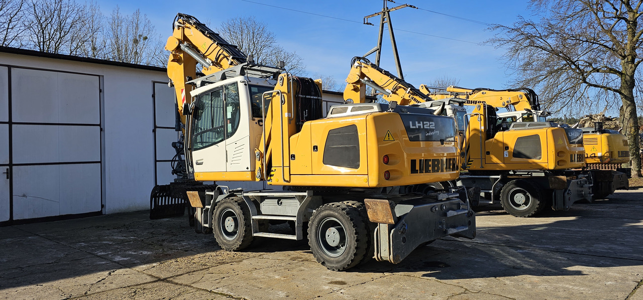 Liebherr LH 22 M - Hulladék kotró: 1 kép. Liebherr LH 22 M - Hulladék kotró: 1 kép.