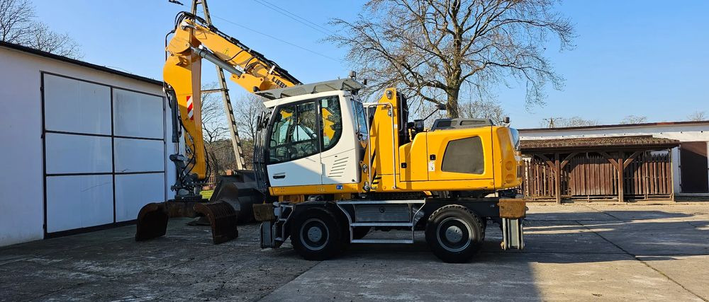 Liebherr LH 22 M - Hulladék kotró: 1 kép. Liebherr LH 22 M - Hulladék kotró: 1 kép.