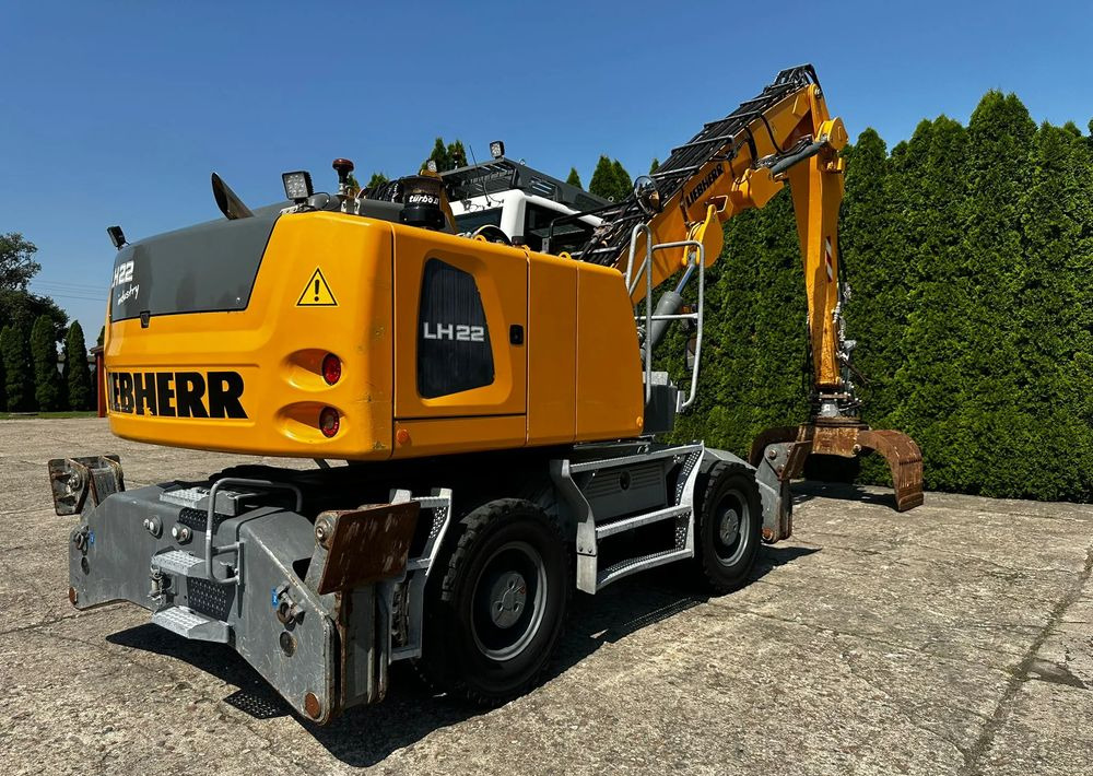 Liebherr LH22 M - Gumikerekes kotró: 1 kép. Liebherr LH22 M - Gumikerekes kotró: 1 kép.