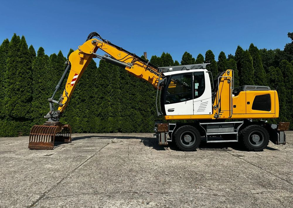 Liebherr LH22 M - Gumikerekes kotró: 5 kép. Liebherr LH22 M - Gumikerekes kotró: 5 kép.