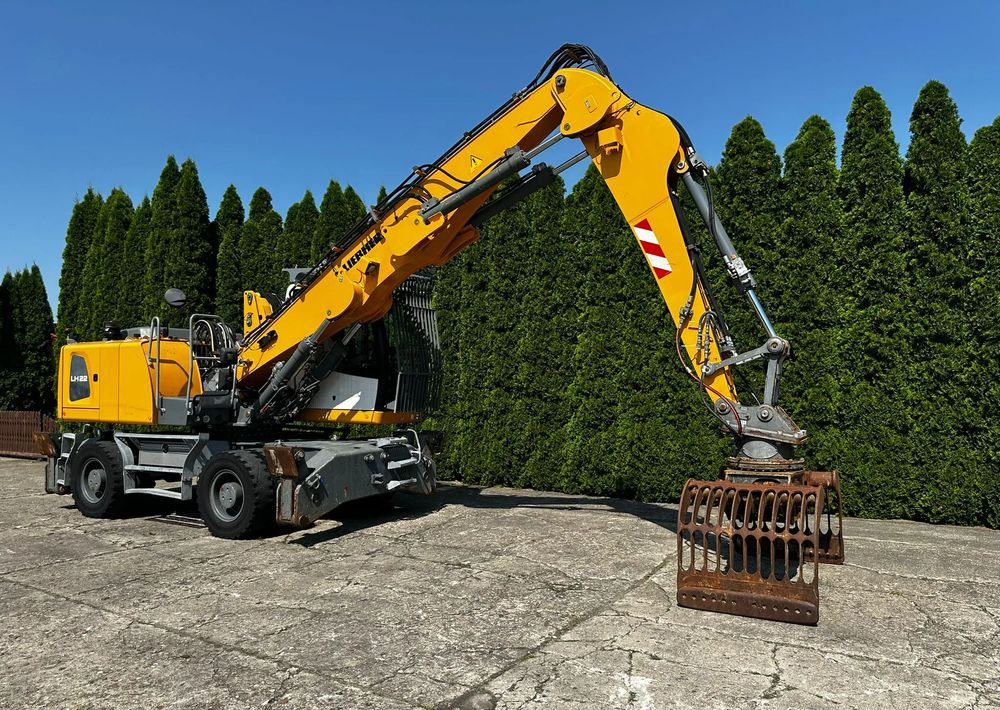Liebherr LH22 M - Gumikerekes kotró: 3 kép. Liebherr LH22 M - Gumikerekes kotró: 3 kép.