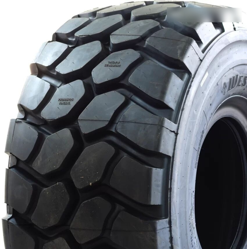 WestLake 23.5R25 CB763 E4/L4 185B/195A2 - Gumiabroncs - Gumikerekes homlokrakodó: 2 kép. WestLake 23.5R25 CB763 E4/L4 185B/195A2 - Gumiabroncs - Gumikerekes homlokrakodó: 2 kép.