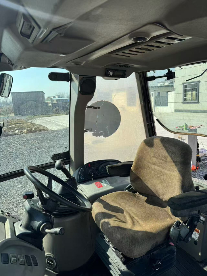 Kotrórakodó CASE 580: 6 kép.