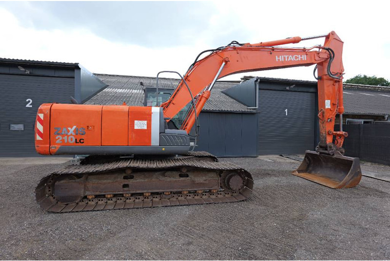 Hitachi ZX 210 LC-3 mono, airco, CW30 - Lánctalpas kotró: 2 kép. Hitachi ZX 210 LC-3 mono, airco, CW30 - Lánctalpas kotró: 2 kép.