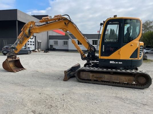 Hyundai R80 -9A - Lánctalpas kotró: 2 kép. Hyundai R80 -9A - Lánctalpas kotró: 2 kép.