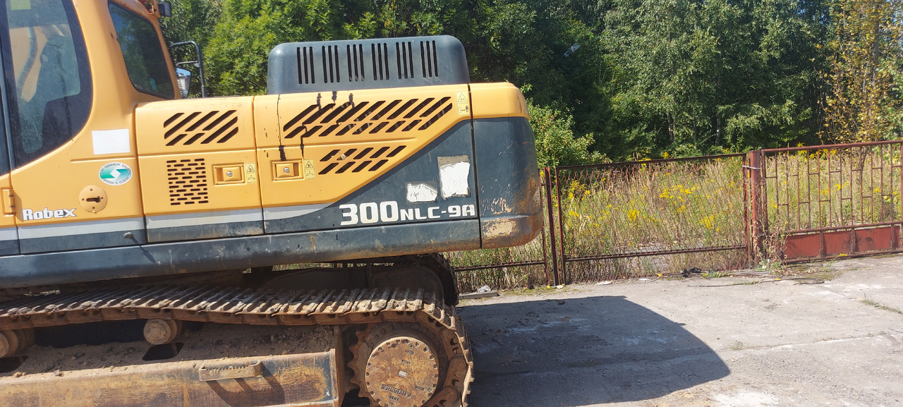 HYUNDAI NLC 300 - Lánctalpas kotró: 4 kép. HYUNDAI NLC 300 - Lánctalpas kotró: 4 kép.