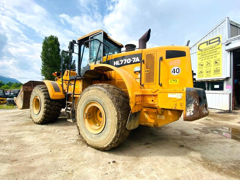 HYUNDAI Chargeuse articulé HL770-7A 23T - Kotrórakodó: 4 kép. HYUNDAI Chargeuse articulé HL770-7A 23T - Kotrórakodó: 4 kép.