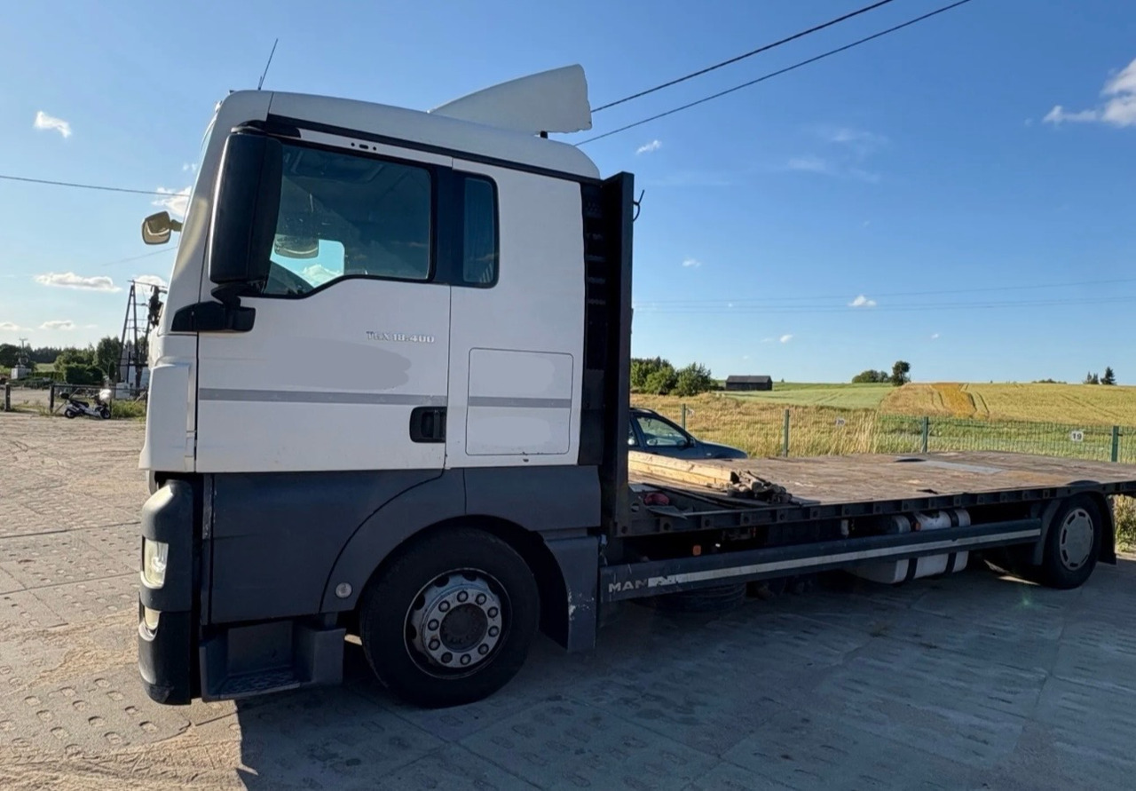 MAN TGX 18.400 / PLATFORMA / 630 TYŚ KM / 2015 ROK / SYPIALKA - Platós teherautó: 2 kép. MAN TGX 18.400 / PLATFORMA / 630 TYŚ KM / 2015 ROK / SYPIALKA - Platós teherautó: 2 kép.