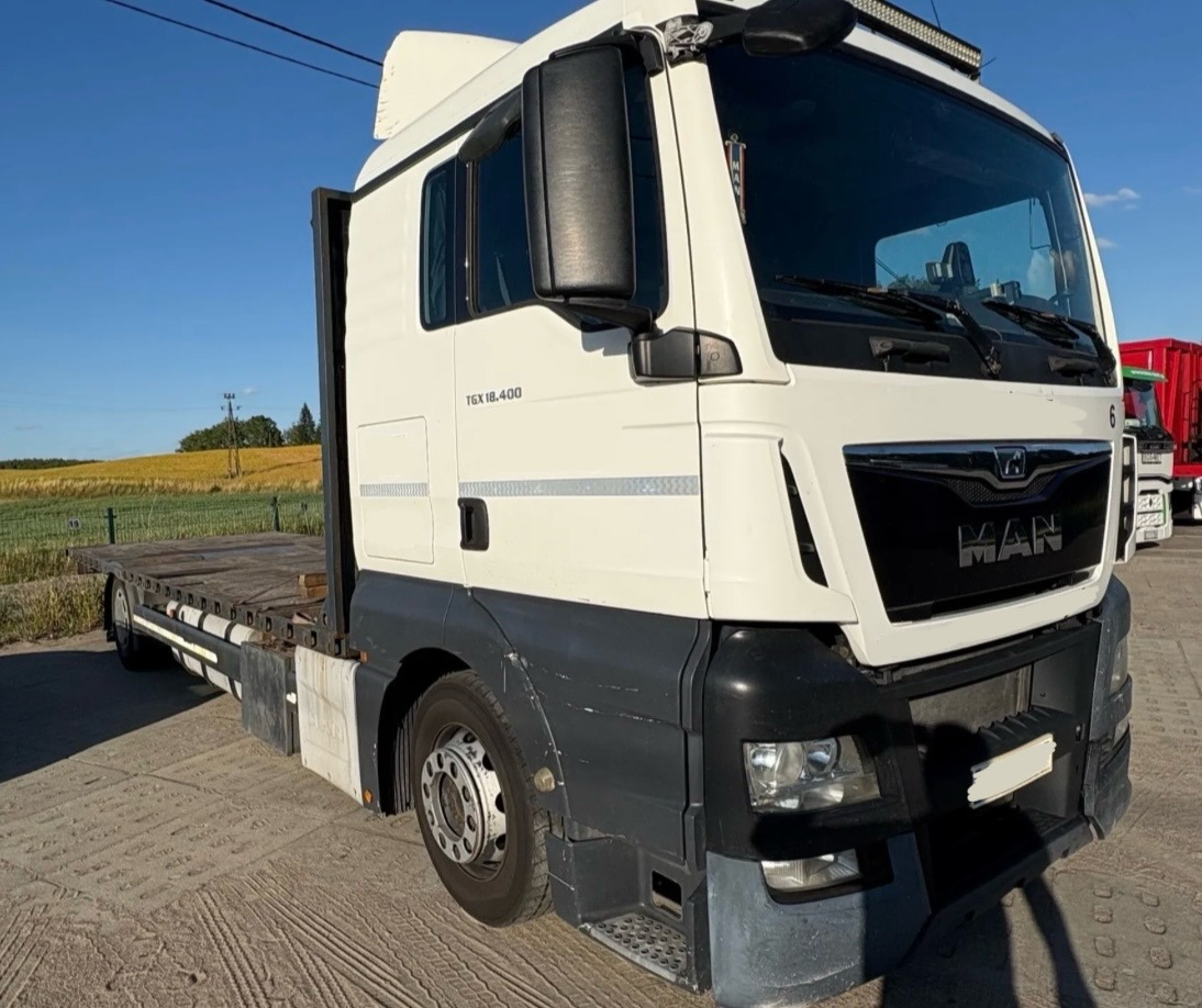 MAN TGX 18.400 / PLATFORMA / 630 TYŚ KM / 2015 ROK / SYPIALKA - Platós teherautó: 1 kép. MAN TGX 18.400 / PLATFORMA / 630 TYŚ KM / 2015 ROK / SYPIALKA - Platós teherautó: 1 kép.
