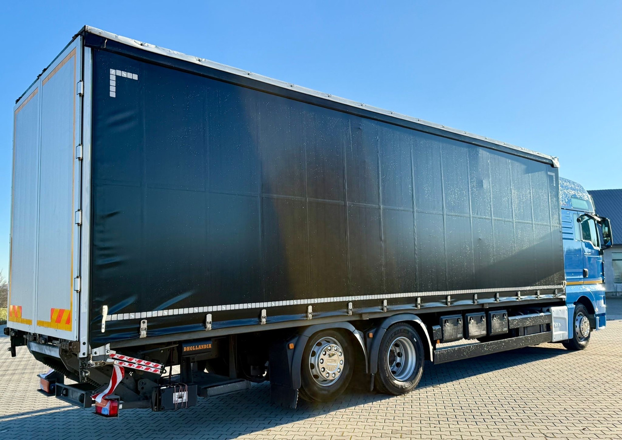 MAN TGX 26.420 / FIRANKA / WINDA / 23 EUROPALETY / 6x2 / AUTOMAT / EURO 6 / OŚ PODNOSZONA / DUŻA KABINA / 2019 ROK - Ponyvás teherautó: 3 kép. MAN TGX 26.420 / FIRANKA / WINDA / 23 EUROPALETY / 6x2 / AUTOMAT / EURO 6 / OŚ PODNOSZONA / DUŻA KABINA / 2019 ROK - Ponyvás teherautó: 3 kép.