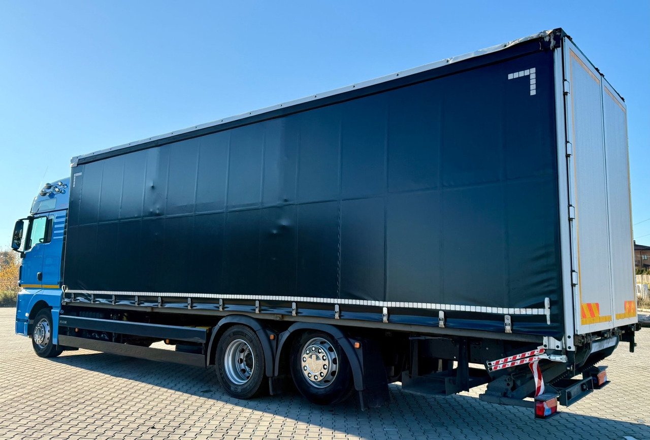 MAN TGX 26.420 / FIRANKA / WINDA / 23 EUROPALETY / 6x2 / AUTOMAT / EURO 6 / OŚ PODNOSZONA / DUŻA KABINA / 2019 ROK - Ponyvás teherautó: 4 kép. MAN TGX 26.420 / FIRANKA / WINDA / 23 EUROPALETY / 6x2 / AUTOMAT / EURO 6 / OŚ PODNOSZONA / DUŻA KABINA / 2019 ROK - Ponyvás teherautó: 4 kép.