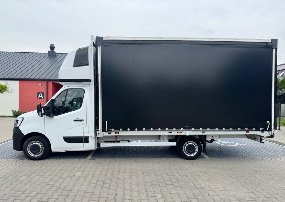 Renault Master - Ponyvás kisteherautó: 2 kép. Renault Master - Ponyvás kisteherautó: 2 kép.