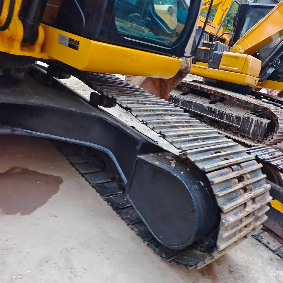 Lánctalpas kotró CAT 323 D: 14 kép.