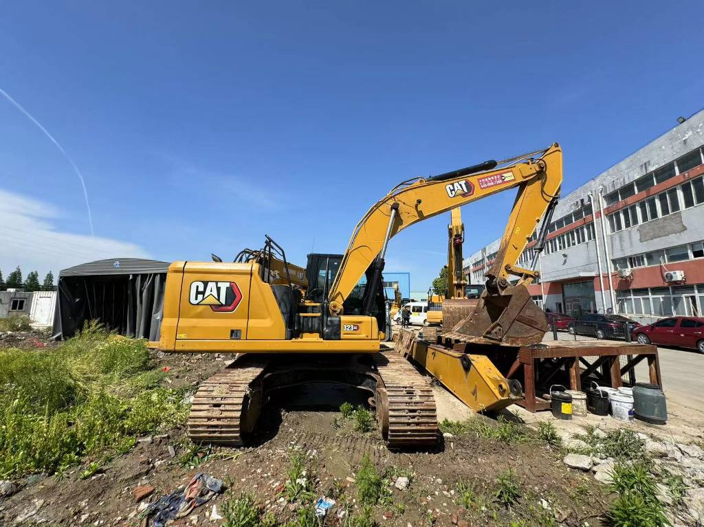 CAT 323GC - Lánctalpas kotró: 1 kép. CAT 323GC - Lánctalpas kotró: 1 kép.