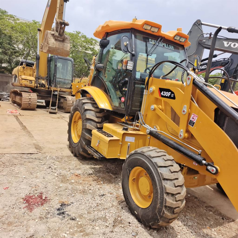 CAT 430 F - Kotrórakodó: 1 kép. CAT 430 F - Kotrórakodó: 1 kép.