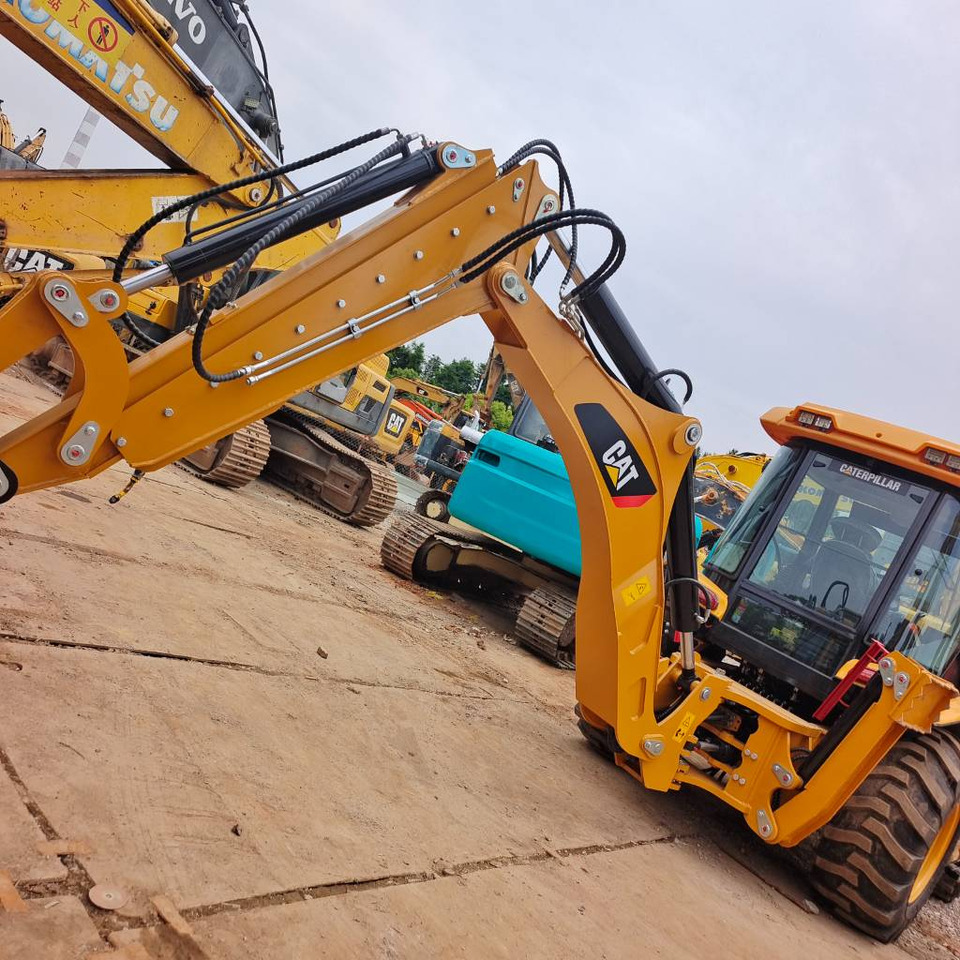 CAT 430 F - Kotrórakodó: 4 kép. CAT 430 F - Kotrórakodó: 4 kép.