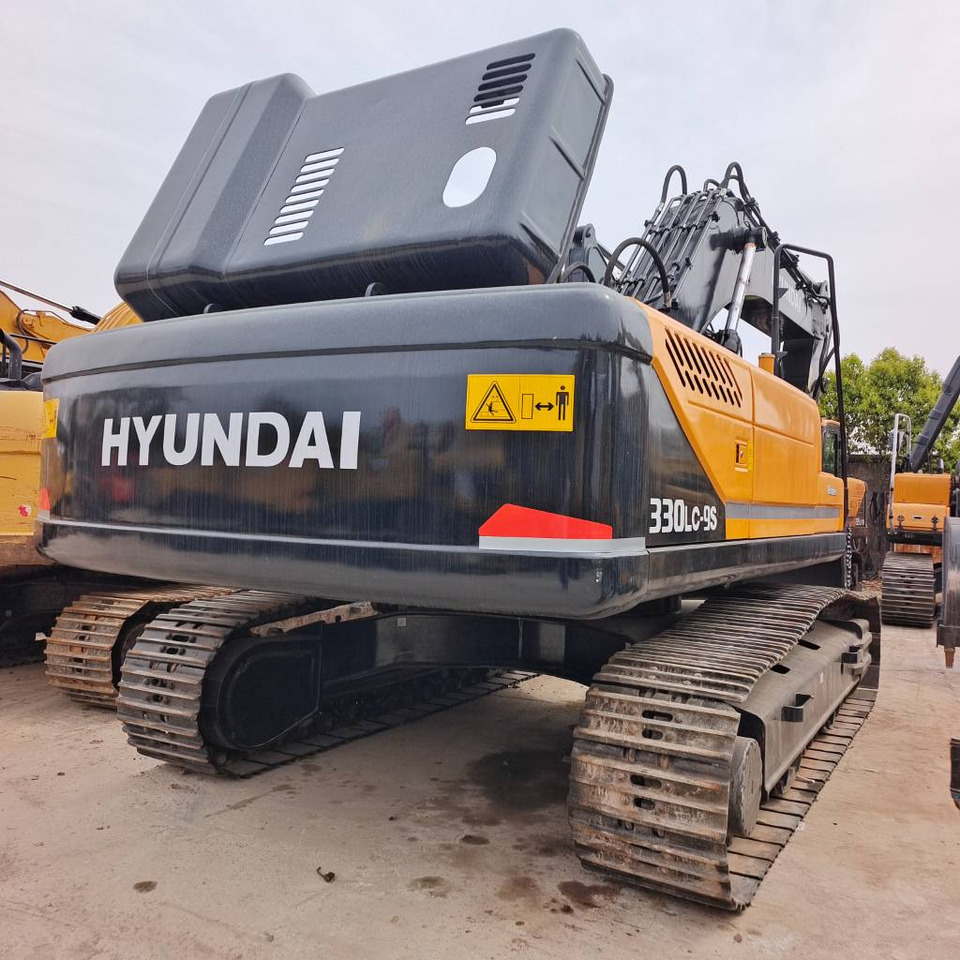 Hyundai 330LC-9T - Lánctalpas kotró: 3 kép. Hyundai 330LC-9T - Lánctalpas kotró: 3 kép.