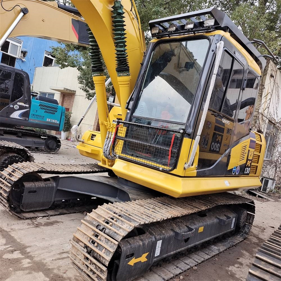Lánctalpas kotró Komatsu PC 130: 11 kép.