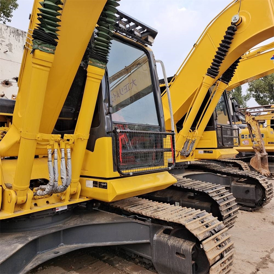 Lánctalpas kotró Komatsu PC 130: 13 kép.