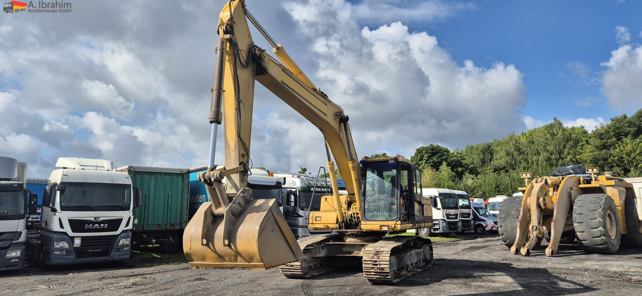Komatsu PC 210 Zustand gut, UVV 12 25 - Lánctalpas kotró: 1 kép. Komatsu PC 210 Zustand gut, UVV 12 25 - Lánctalpas kotró: 1 kép.