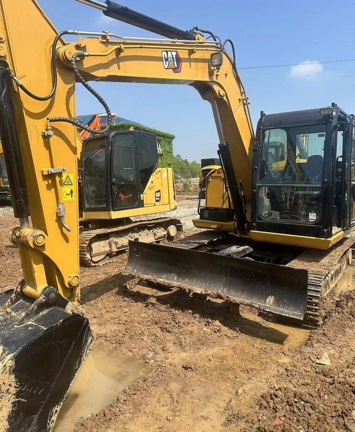 Caterpillar 308E - Lánctalpas kotró: 3 kép. Caterpillar 308E - Lánctalpas kotró: 3 kép.