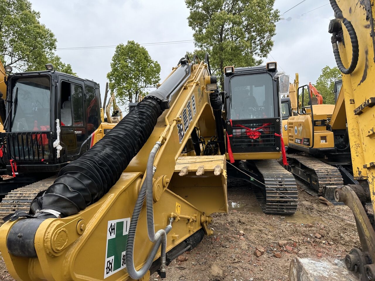 Caterpillar 313DL - Lánctalpas kotró: 3 kép. Caterpillar 313DL - Lánctalpas kotró: 3 kép.