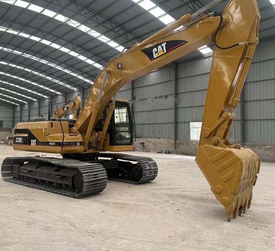 Lánctalpas kotró Caterpillar 320BL: 6 kép.