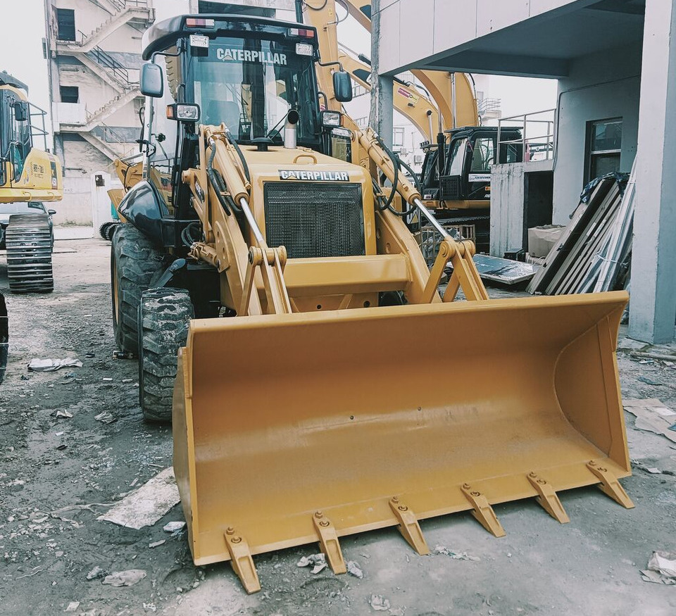 Caterpillar 430F - Kotrórakodó: 4 kép. Caterpillar 430F - Kotrórakodó: 4 kép.