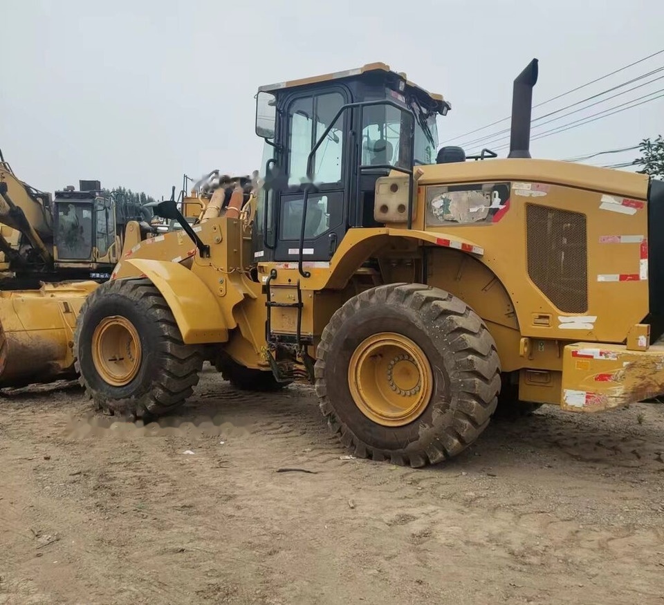 Caterpillar 950GC - Gumikerekes homlokrakodó: 1 kép. Caterpillar 950GC - Gumikerekes homlokrakodó: 1 kép.