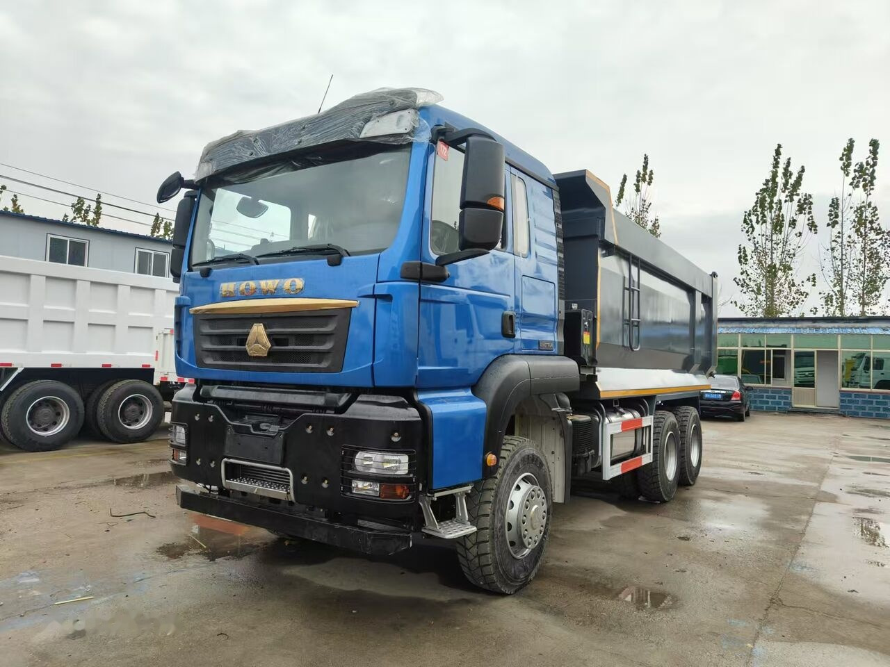 Howo TX 450 - Billenőplatós teherautó: 5 kép. Howo TX 450 - Billenőplatós teherautó: 5 kép.