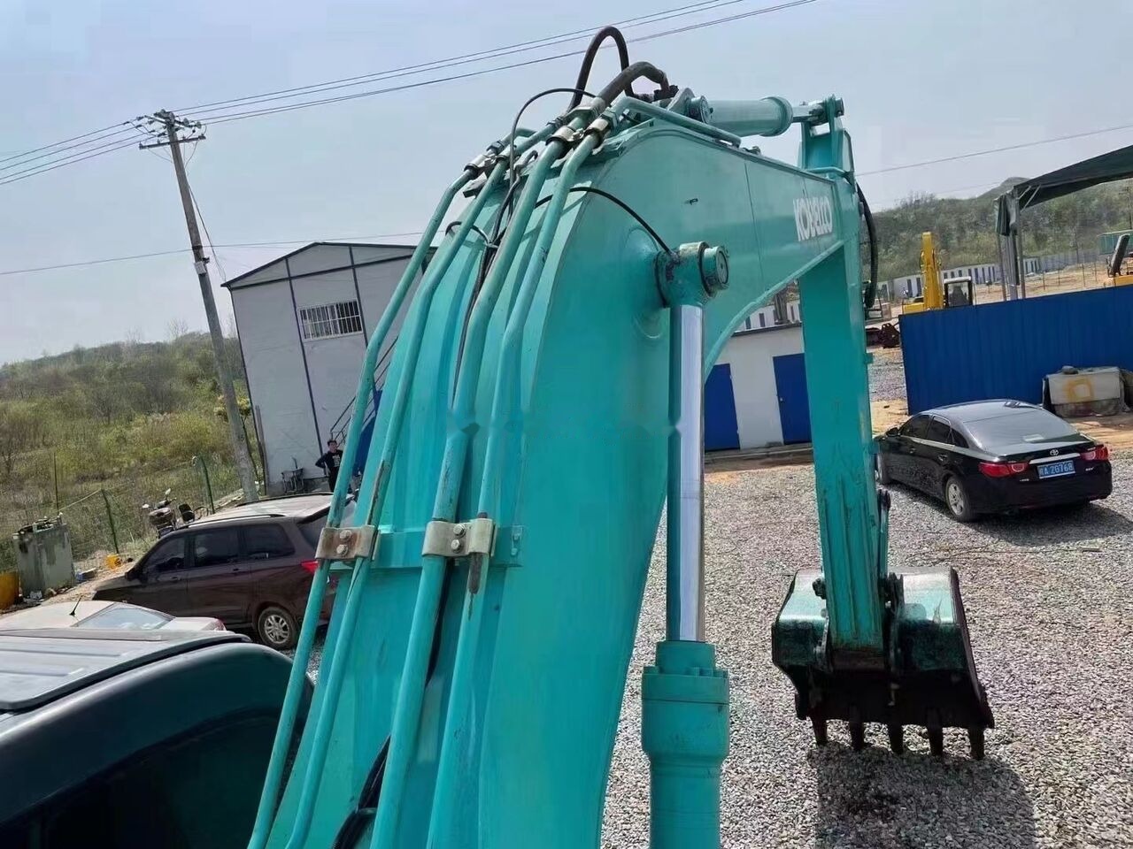 Kobelco SK260 - Lánctalpas kotró: 2 kép. Kobelco SK260 - Lánctalpas kotró: 2 kép.