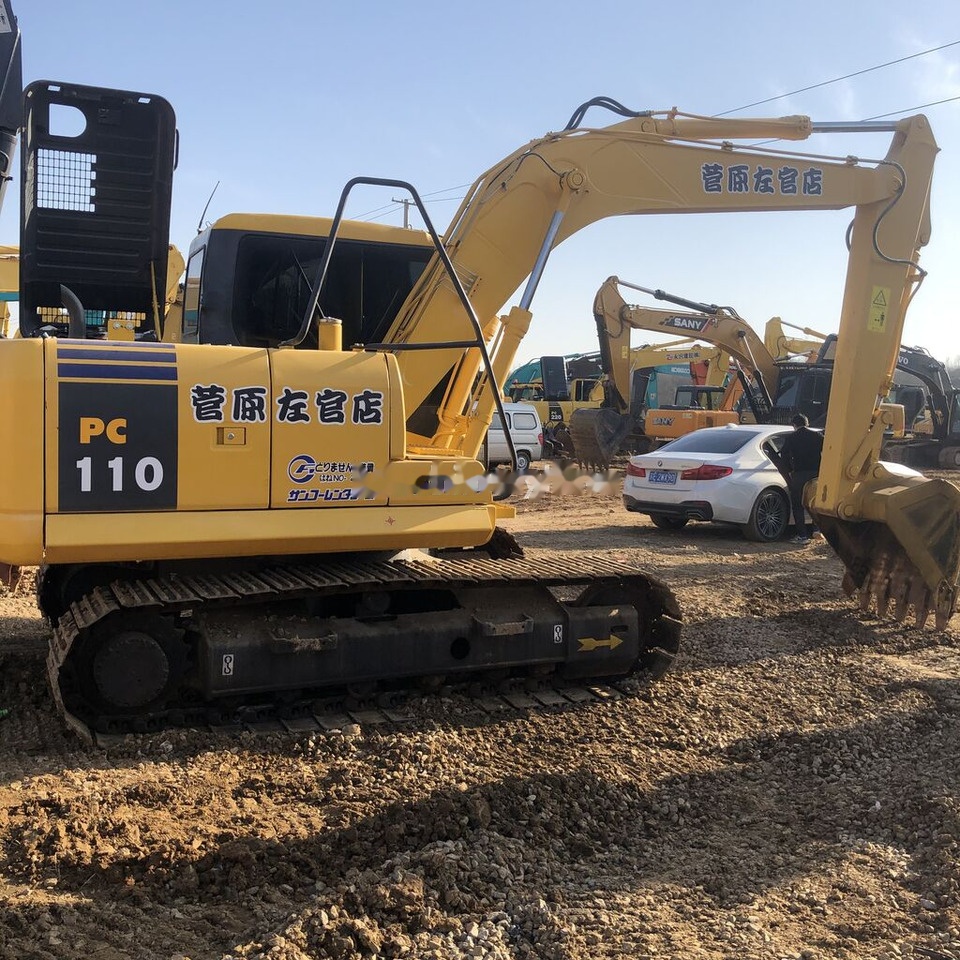 Komatsu PC110 - Lánctalpas kotró: 5 kép. Komatsu PC110 - Lánctalpas kotró: 5 kép.