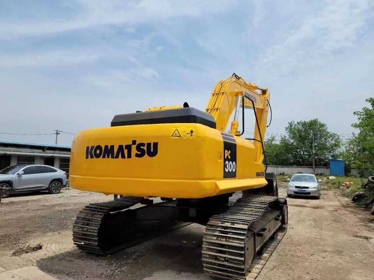 Komatsu PC300-7 - Lánctalpas kotró: 4 kép. Komatsu PC300-7 - Lánctalpas kotró: 4 kép.