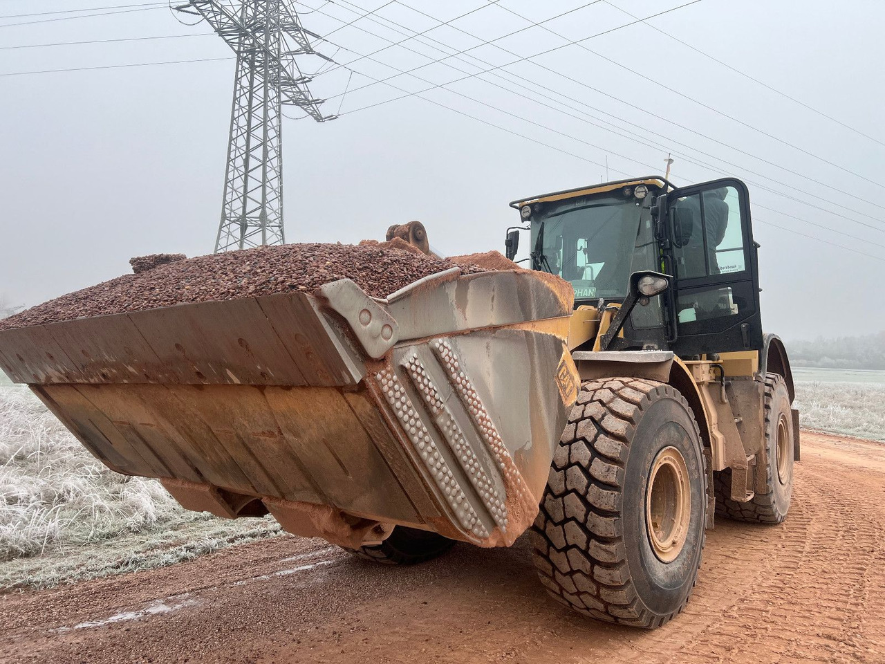 CAT 972 MXE - Gumikerekes homlokrakodó: 1 kép. CAT 972 MXE - Gumikerekes homlokrakodó: 1 kép.