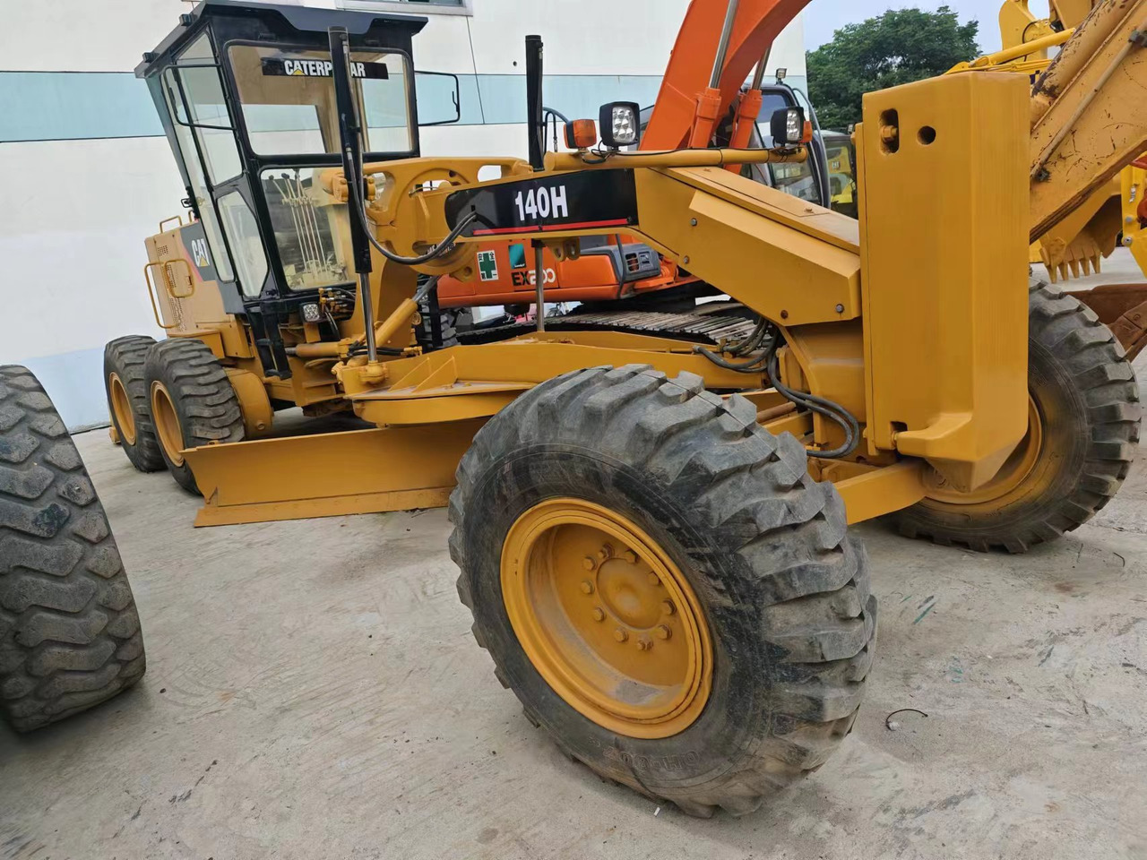 CAT 140H - Gréder: 3 kép. CAT 140H - Gréder: 3 kép.