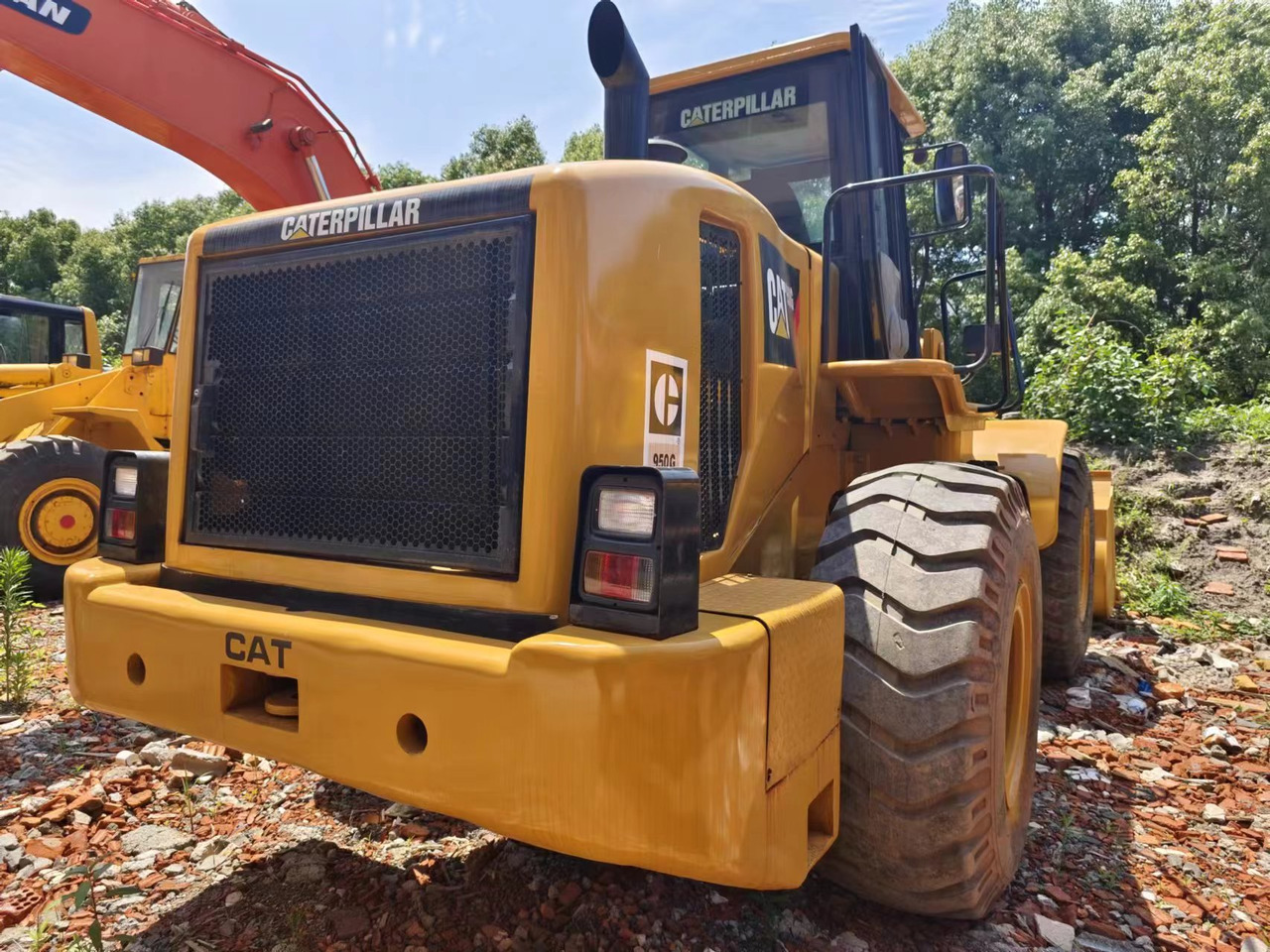 CAT 950G - Gumikerekes homlokrakodó: 4 kép. CAT 950G - Gumikerekes homlokrakodó: 4 kép.