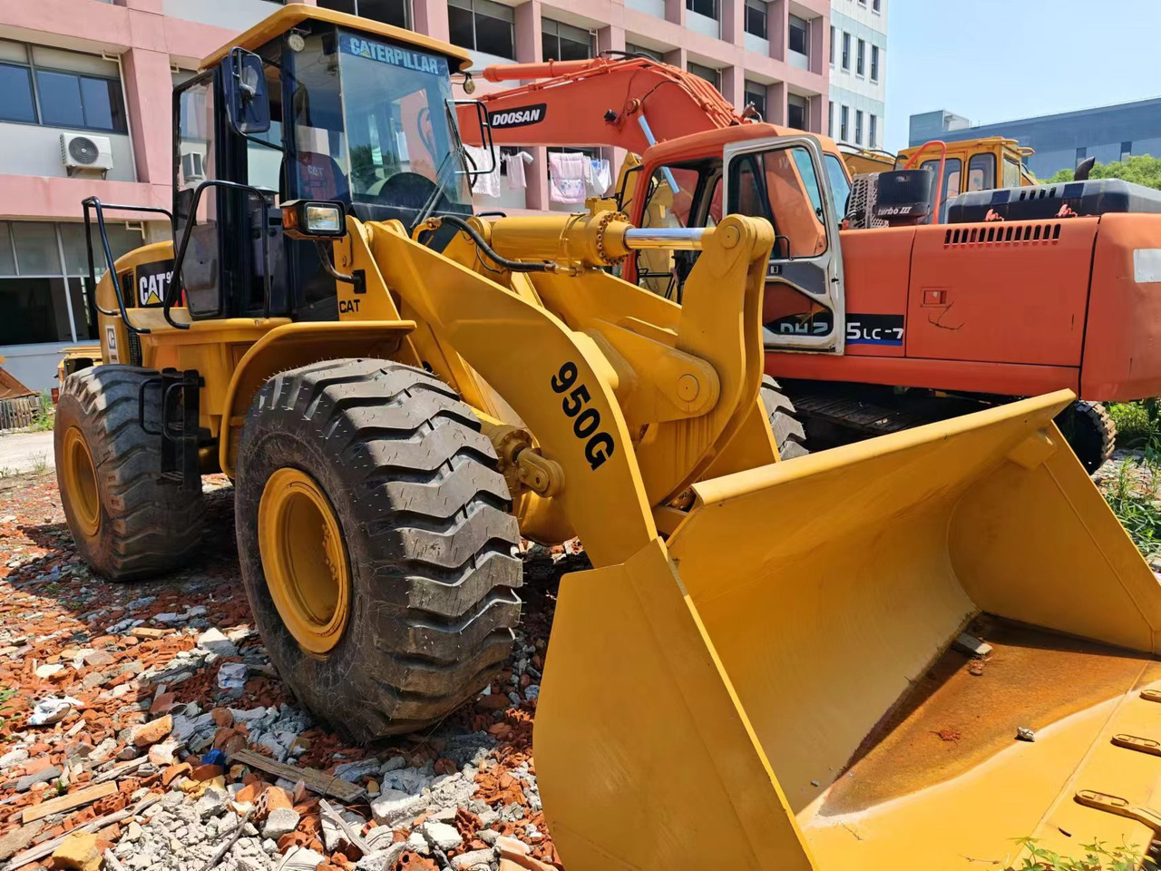 CAT 950G - Gumikerekes homlokrakodó: 1 kép. CAT 950G - Gumikerekes homlokrakodó: 1 kép.