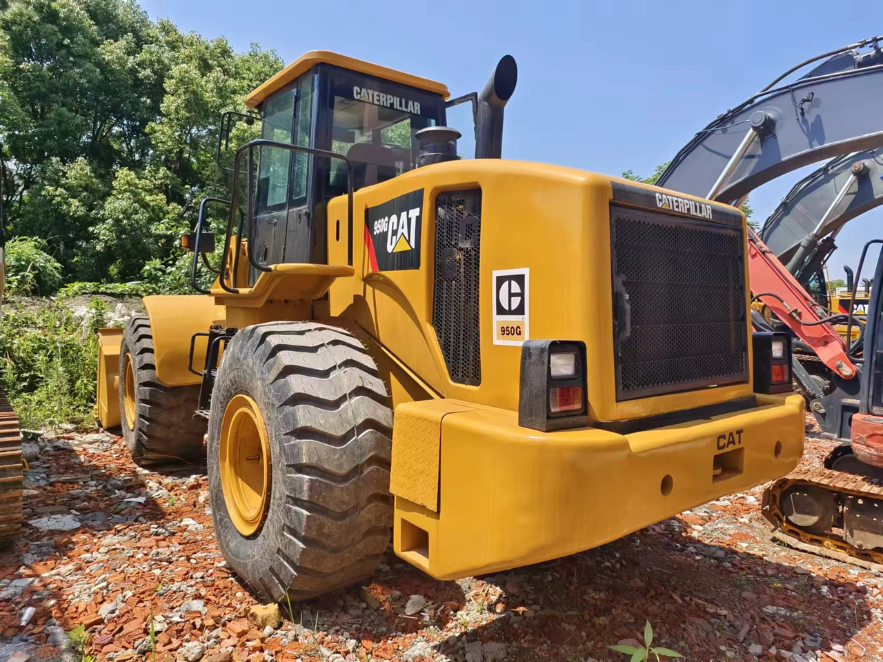 CAT 950G - Gumikerekes homlokrakodó: 2 kép. CAT 950G - Gumikerekes homlokrakodó: 2 kép.