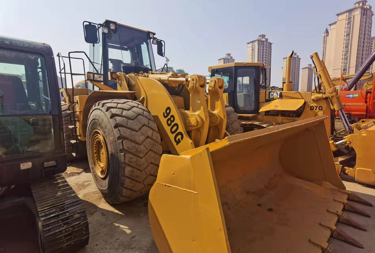 CATERPILLAR 980G - Gumikerekes homlokrakodó: 1 kép. CATERPILLAR 980G - Gumikerekes homlokrakodó: 1 kép.