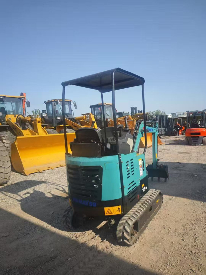 KOMATSU PC18 - Minikotró: 3 kép. KOMATSU PC18 - Minikotró: 3 kép.