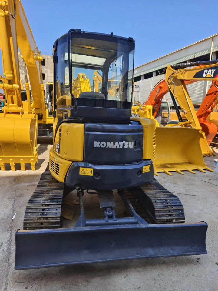 KOMATSU PC55MR - Minikotró: 3 kép. KOMATSU PC55MR - Minikotró: 3 kép.