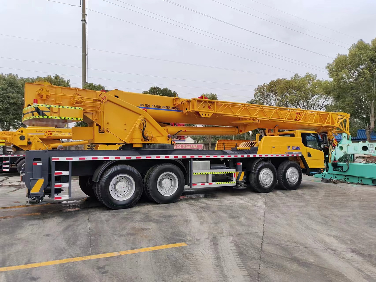XCMG QY75KC QY75K truck crane 75tons - Autódaru: 1 kép. XCMG QY75KC QY75K truck crane 75tons - Autódaru: 1 kép.
