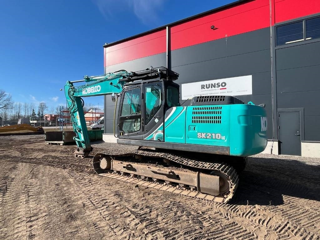 Kobelco SK 210 LC-10E - Lánctalpas kotró: 3 kép. Kobelco SK 210 LC-10E - Lánctalpas kotró: 3 kép.