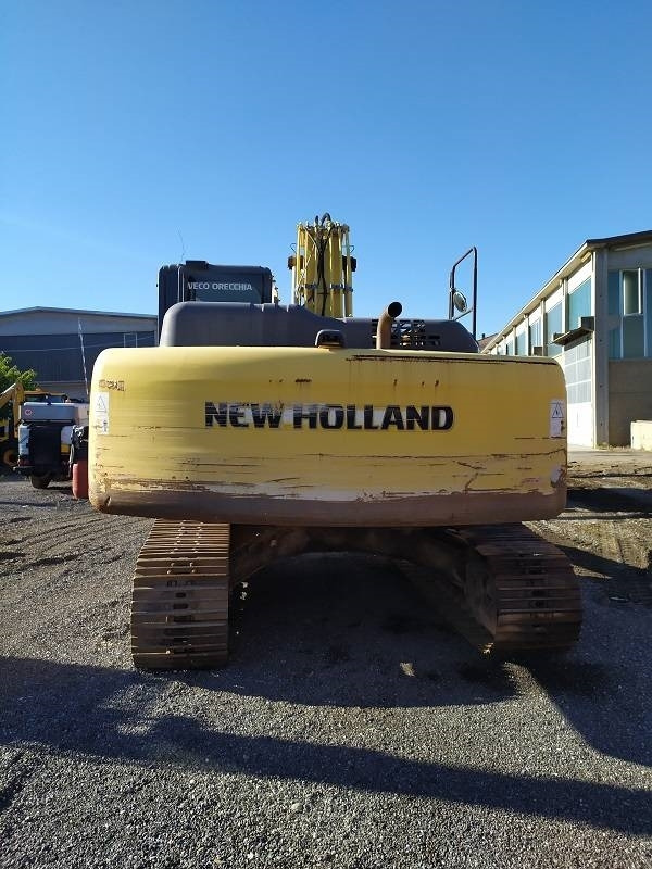 New Holland E 265 C - Lánctalpas kotró: 3 kép. New Holland E 265 C - Lánctalpas kotró: 3 kép.